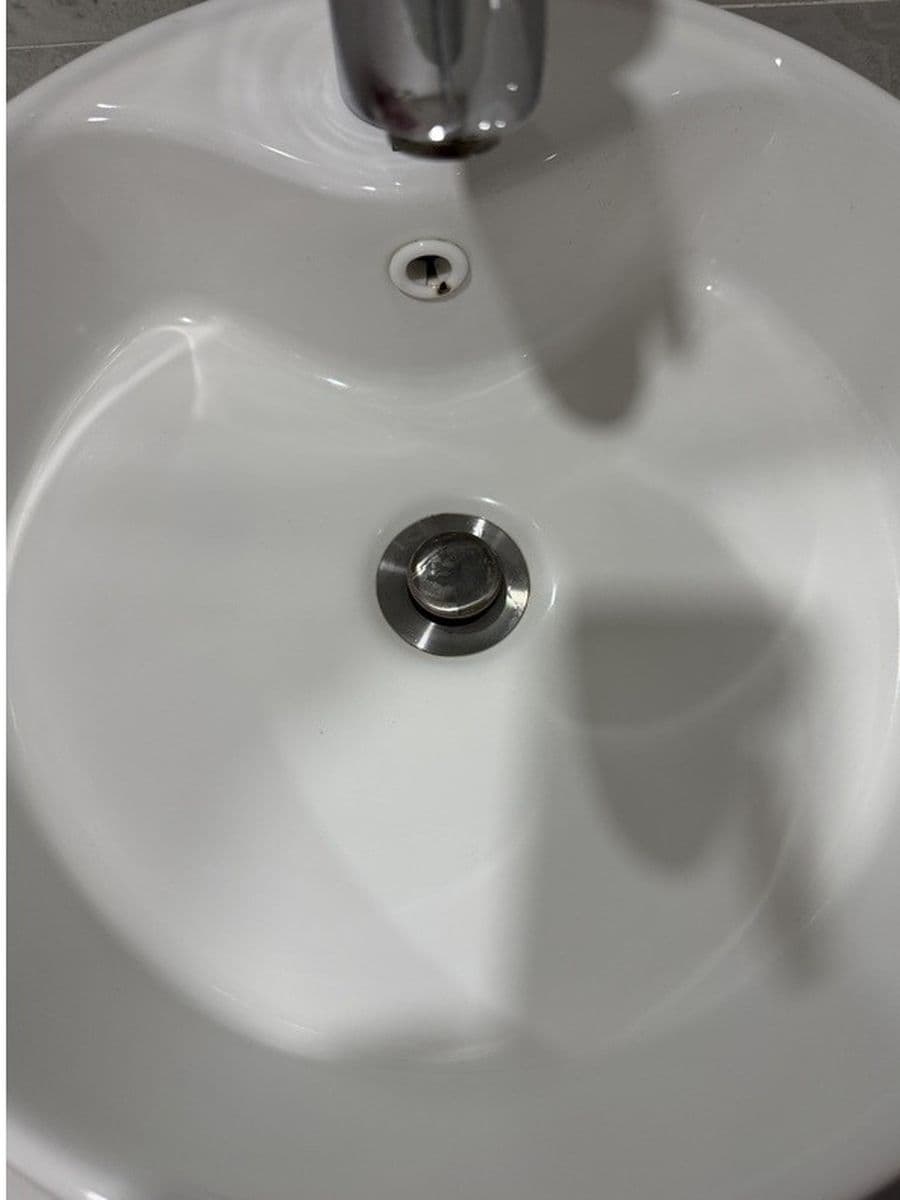 Bathroom basin after cleaning by Red Deer House Cleaning