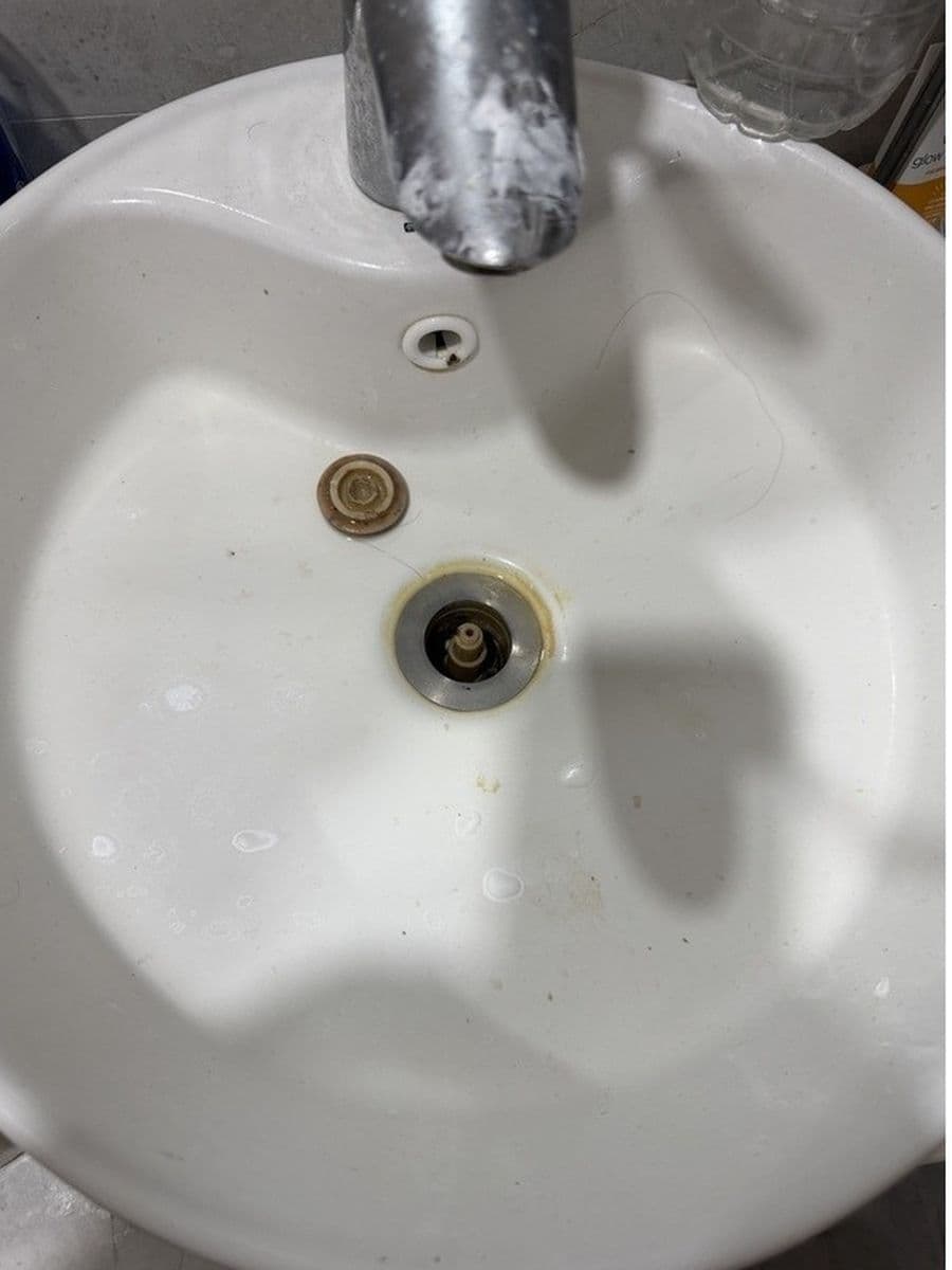 Bathroom basin before cleaning by Red Deer House Cleaning