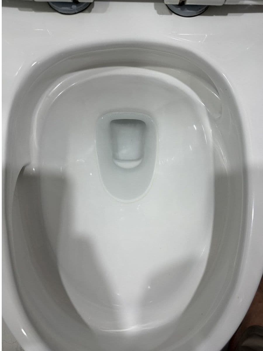 Toilet bowl and rim after cleaning by Red Deer House Cleaning