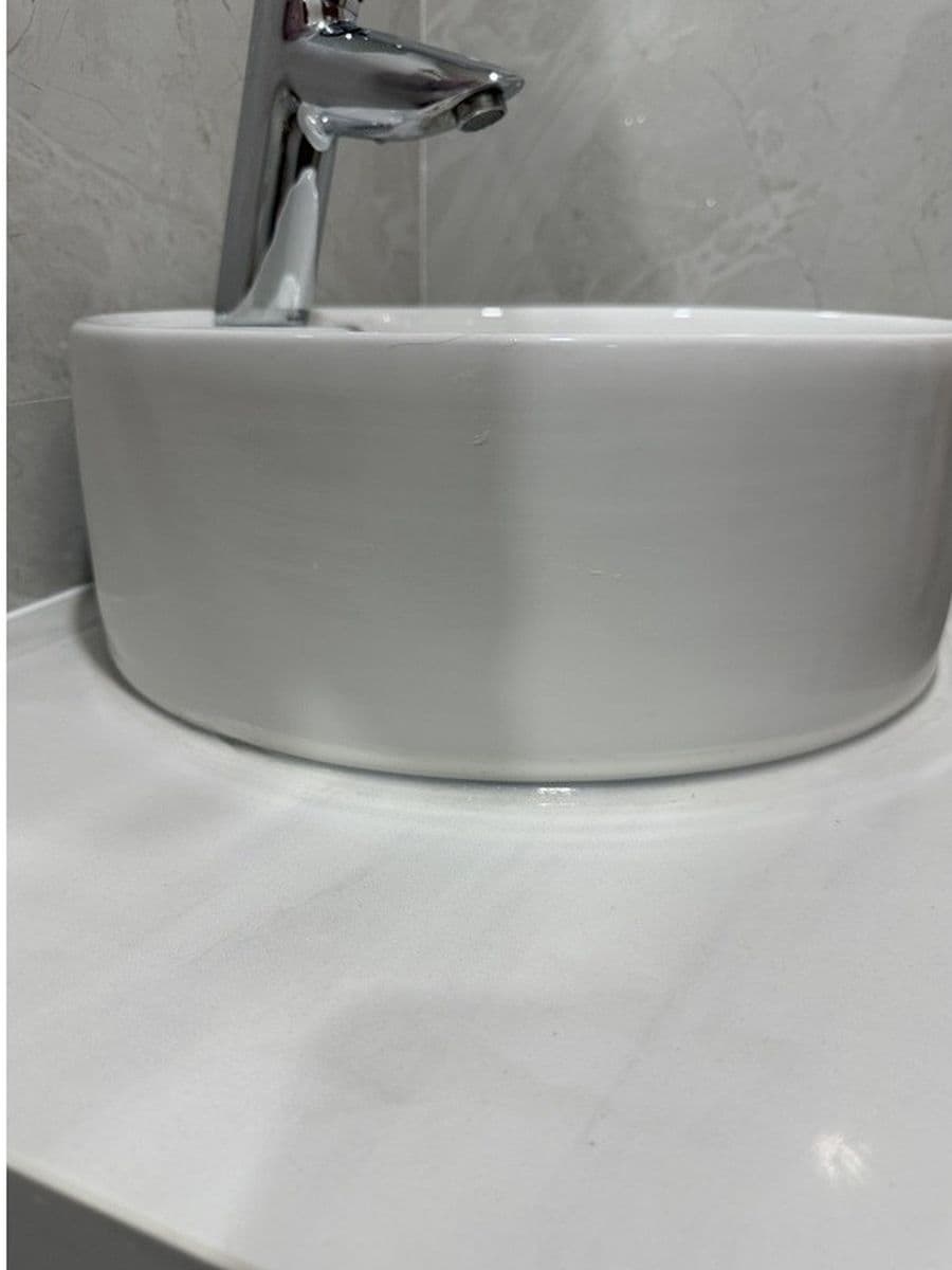 Vessel basin and counter after cleaning by Red Deer House Cleaning
