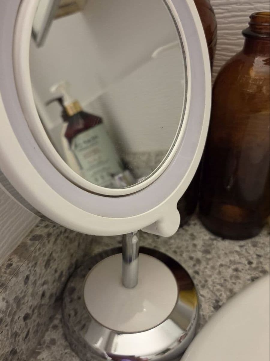 Vanity mirror and base after cleaning by Red Deer House Cleaning