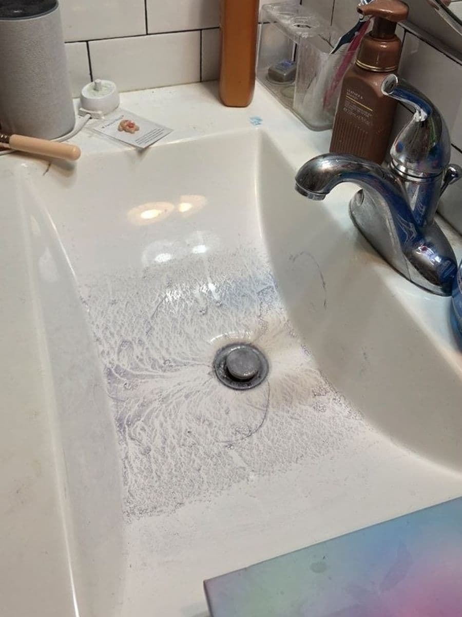 Bathroom vanity before cleaning by Red Deer House Cleaning